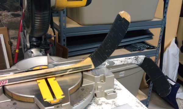 cutting composite hockey sticks on mitre saw