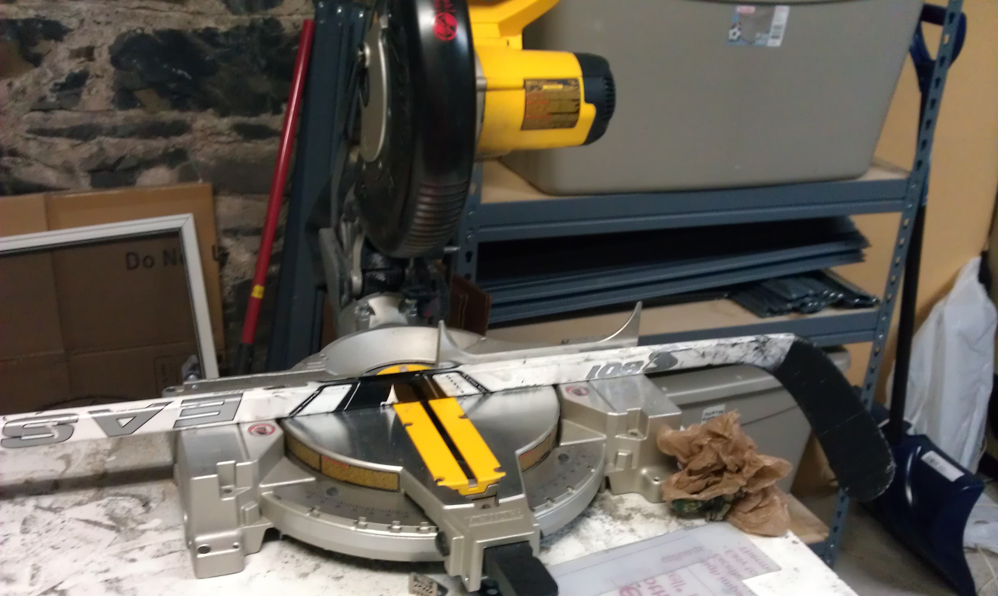Single composite stick on mitre saw